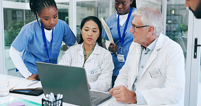 Doctors, nurses and laptop for meeting, medical teamwork and solution in hospital or clinic management. Senior expert, healthcare people or group for online problem solving and research on a computer