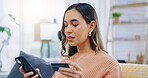 Phone, credit card and woman on a sofa with ecommerce, sale or bank, loan and payment in her home. Smartphone, app and female person in a living room for online shopping, code or password for sign up