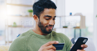 Buy stock photo Man, credit card and phone on home sofa and online shopping with financial decision, ecommerce or sale. Person, smartphone and easy payment with click, banking or fintech on lounge couch in house