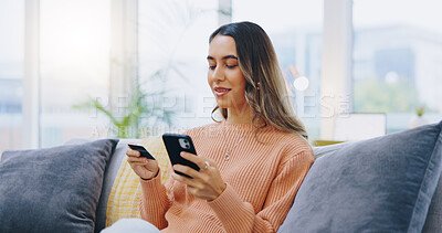 Credit card, phone and woman on a sofa with ecommerce, sale or bank, loan and payment in her home. Smartphone, app and female person in a living room for online shopping, code or password for sign up