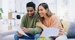 Couple, tax documents and happy on sofa with reading, review and compliance for financial freedom in home. Man, woman and smile together for results, feedback and credit score with paperwork on couch