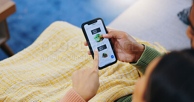 Buy stock photo Phone, screen and couple on sofa with food app, delivery or choice closeup in their home. Smartphone, menu and hand of people with online shopping, decision or search for brunch, meal or takeout