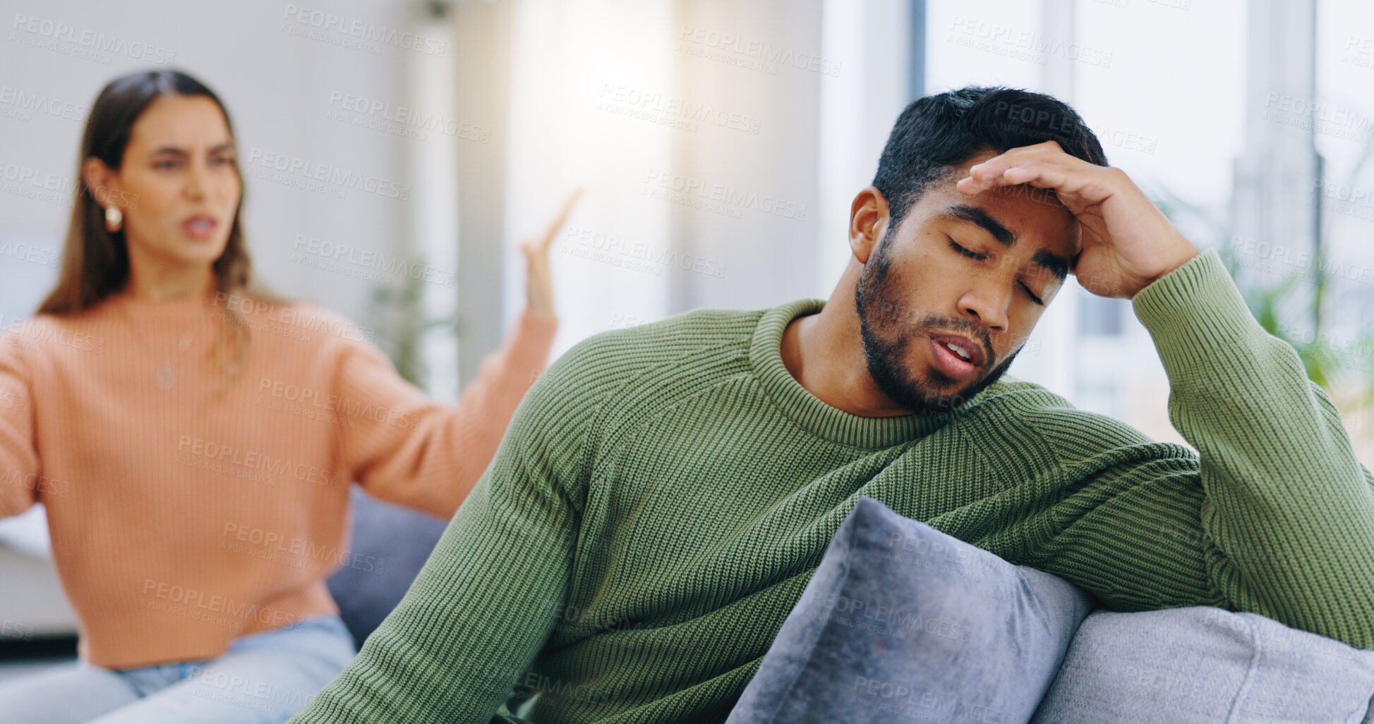 Buy stock photo Couple, home and fight on couch, sad and angry with stress, mental health and headache with relationship crisis. Man, woman and questions on lounge sofa with conflict, anxiety and mistake in marriage