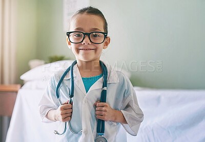 Buy stock photo Girl child, portrait and playing doctor with smile, glasses and holding stethoscope in home, hospital or clinic. Female kid, play medic and happy with excited face, learning and game for development