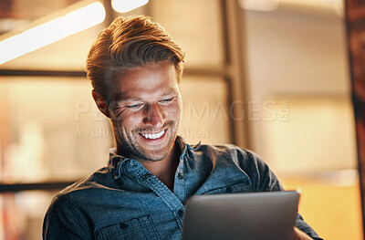 Buy stock photo Night, business and man with a tablet, typing and smile with connection, project and communication. Person, evening and creative employee with technology, email notification and internet for research