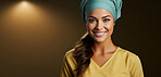 Portrait, mockup and woman with nurse scrubs, medical and healthcare helper against a yellow studio background. Female person, doctor or happy model with happiness, career and medicine professional