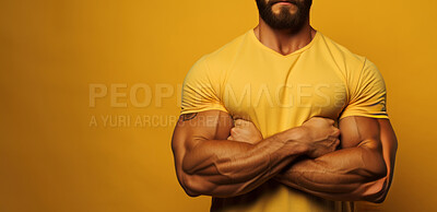 Anonymous man, arms crossed and muscle portrait with yellow banner, background and backdrop in studio with fashionable or stylish clothes and confident athlete in workout, exercise and bodybuilder pose