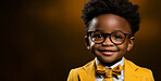 Child, portrait and fashion with yellow bow tie, glasses and smile on mockup banner background. Face, kid and male youth with cool, trendy and confident clothes style on studio space