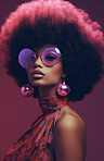 Black woman, musician and portrait of a jazz or soul music singer in a photography studio. Afro, African or confident female with curly hair for beauty, disco or 70's style fashion for background