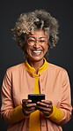 Senior african woman, portrait and phone for social media app, internet and website on color background mockup. Face, smile and happy pensioner with mobile technology for influencer blog post in house