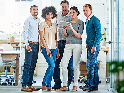 Buy stock photo Portrait of a diverse group of coworkers standing in an office