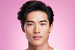 Asian, male and beauty portrait of a man for skincare, health and cosmetics. Handsome, confident and attractive person with smooth healthy skin routine for grooming, dermatology and hygiene in studio