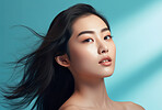 Asian, female and beauty portrait of a woman for skincare, health and cosmetics. Beauty, confident and attractive person with smooth healthy skin routine for glow, dermatology and haircare in studio