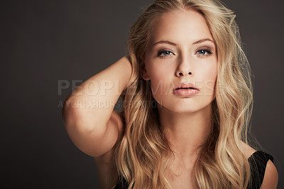 Buy stock photo Makeup, beautiful and portrait of a woman with confidence isolated on a dark background in a studio. Young, confident and the face of a cosmetics model looking gorgeous with a facial cosmetic look
