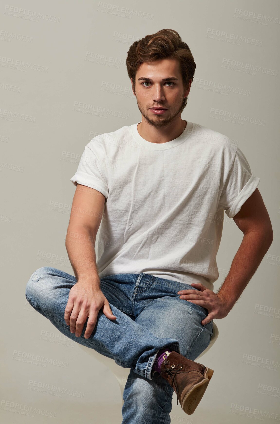 Buy stock photo Portrait, sexy or man with fashion, casual or confident model against a grey studio background. Male person, luxury or guy with clothes, cool outfit or natural with youth, Canada or trendy streetwear