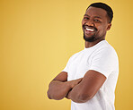 Man, portrait and smile in studio on yellow background, confidence or mockup space. Black person, model and happy face in positive mood for relax decision or deal information, yes news or show offer