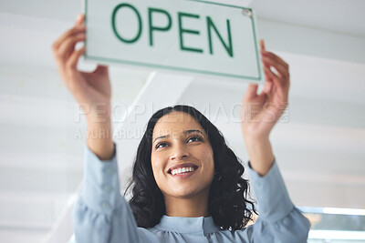 Buy stock photo Woman, open sign and window store for company hours as professional owner, entrepreneur for customer notice. Female person, smile and holiday information for sales poster, service news for welcome