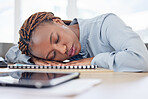 African woman, tired and sleeping on office table with rest, burnout and nap for overtime, project and documentation. Employee, person and eyes closed for exhausted, fatigue and dream in workplace