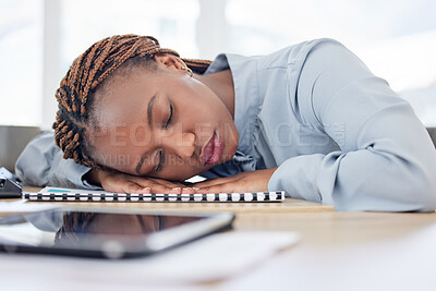 Buy stock photo African woman, tired and sleeping on office table with rest, burnout and nap for overtime, project and documentation. Employee, person and eyes closed for exhausted, fatigue and dream in workplace