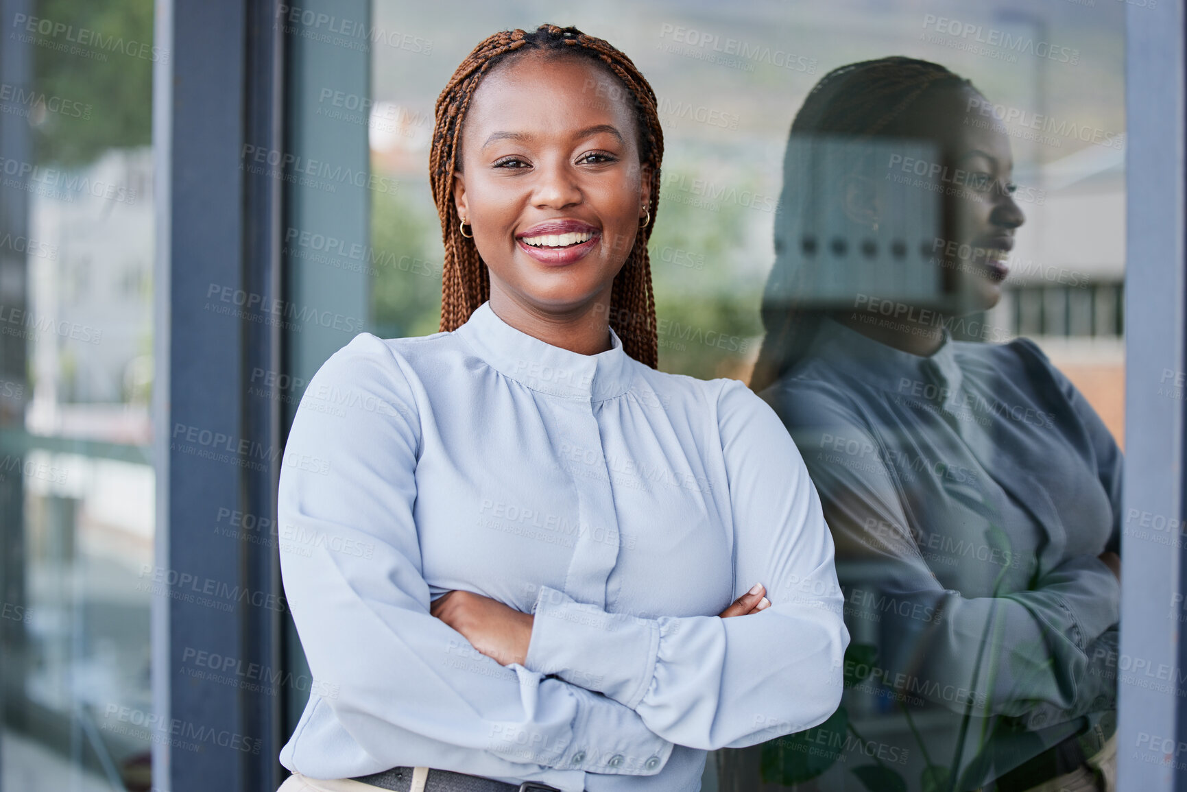 Buy stock photo Happy, crossed arms and professional black woman at office with positive, good and confident attitude. Smile, smart and portrait of young African female attorney with law career at workplace.