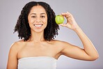 Apple, fruit and portrait of a black woman holding wellness food for detox and weight loss. Skincare, beauty and young model in a isolated studio for nutrition and vitamin diet for skin glow 