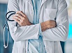 Man, doctor and hands in professional healthcare with arms crossed or stethoscope at the hospital. Closeup of male person, nurse or surgeon in confidence for medical procedure or surgery at clinic