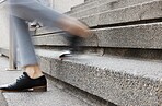Stairs, legs and outdoor person walking, leave or on urban journey, business commute or trip to destination. Motion blur steps and moving feet, closeup shoes or city person departure on staircase