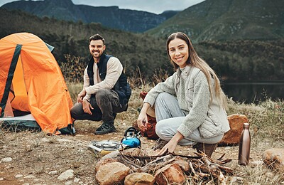 Buy stock photo Happy couple, camp and tent in nature for holiday, vacation or outdoor trip in countryside. Man and woman smile in travel for camping, journey or adventure together on mountain by campfire outside
