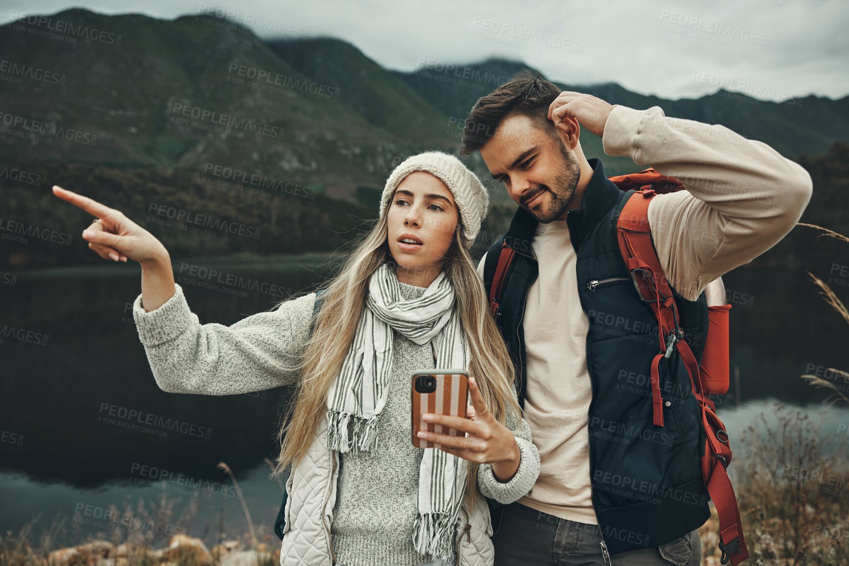 Buy stock photo Hiking, anxiety and lost couple with a phone in nature for direction, map or navigation with stress. Backpacking, travel and people with smartphone app for location search or navigation to campsite