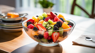 Salad, dessert and mixed fruit bowl with a kitchen background for breakfast, health and diet. Colourful, vibrant and healthy fitness meal or snack for lifestyle, nutrition and organic fresh product