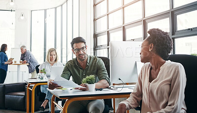 Buy stock photo Office, business and colleagues talking or in discussion while working on a project in a coworking space. Interracial, communication and corporate employees in a conversation or consult in workplace.