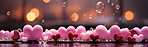 Heart shapes, confetti and background for celebration, love or decoration. Background, abstract and banner for valentines day, relationship and engagement with beautiful romantic colours and bokeh