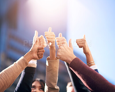 Buy stock photo Thumbs up, group or people in agreement with hands on blue sky outdoors. Teamwork, collaboration or community diversity and colleagues in support gesture outside in city background with flare mockup
