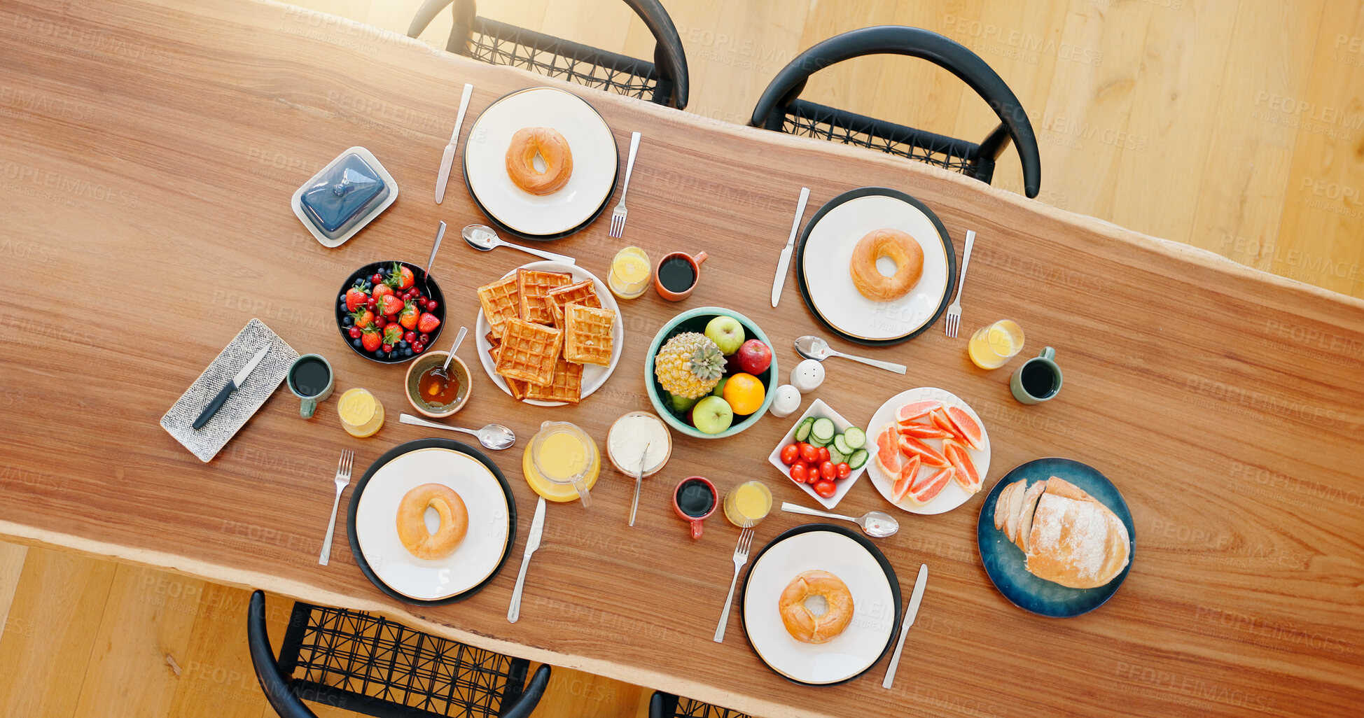 Buy stock photo Healthy, breakfast and food on dining table with top view, fruit and coffee for wellness and nutrition. Morning, brunch and meal with waffles, donut and cutlery for snack or gourmet diet from above