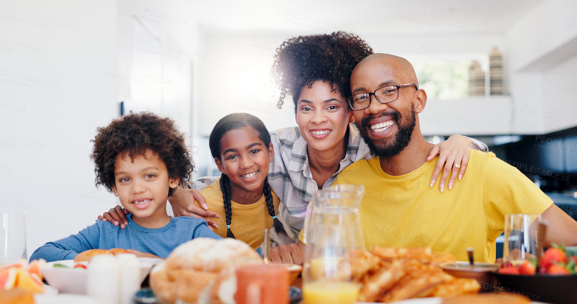 Buy stock photo Love, portrait and happy family with breakfast at a kitchen table for morning, routine or eating while bonding. Food, nutrition or kids with parents in a house with fruit, diet or brunch meal at home