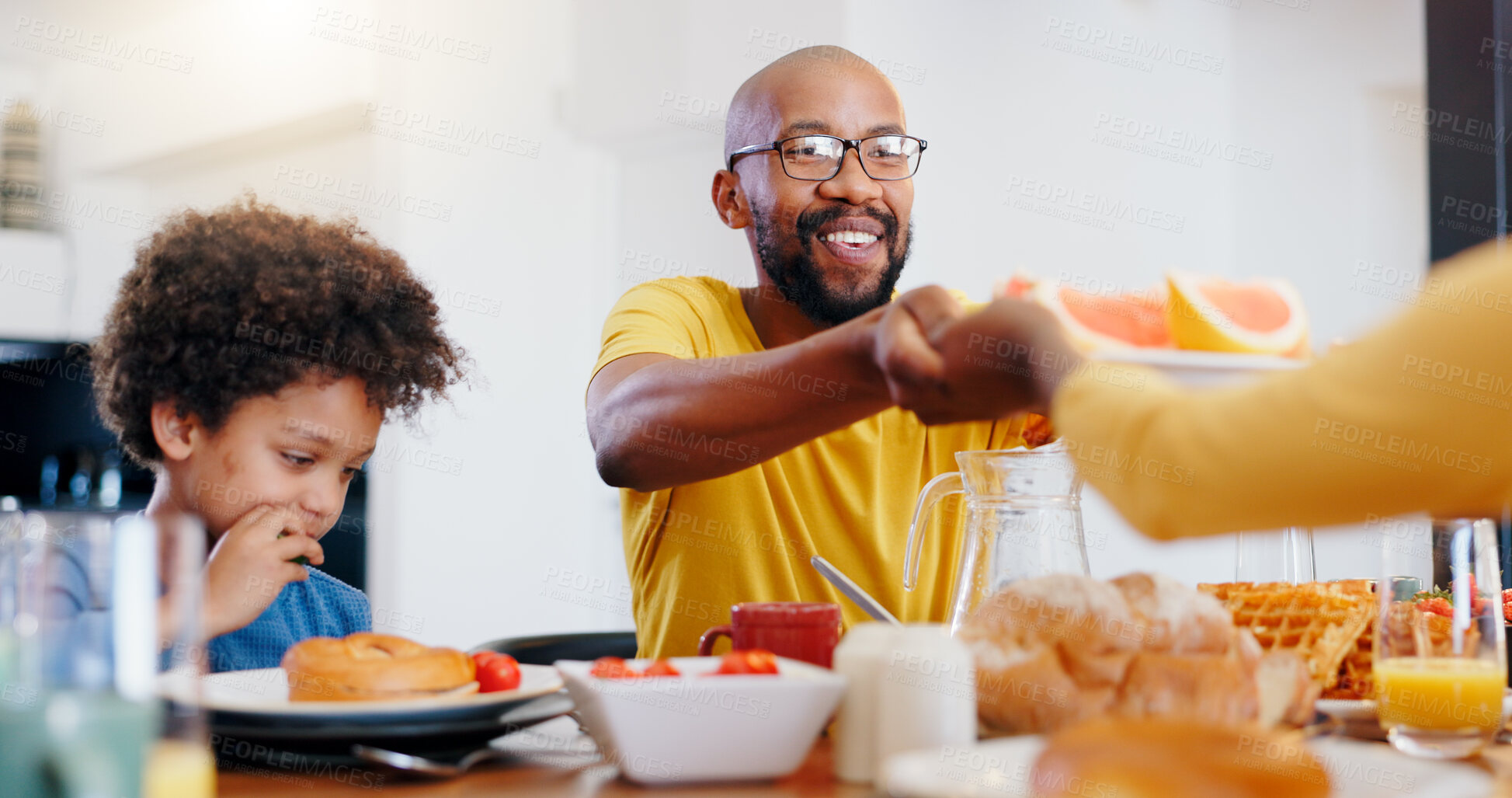 Buy stock photo Black family, food and parents with children for breakfast, lunch and eating together in home. Happy, serving and dad and boy at table for bonding with meal for health, nutrition and hunger in house