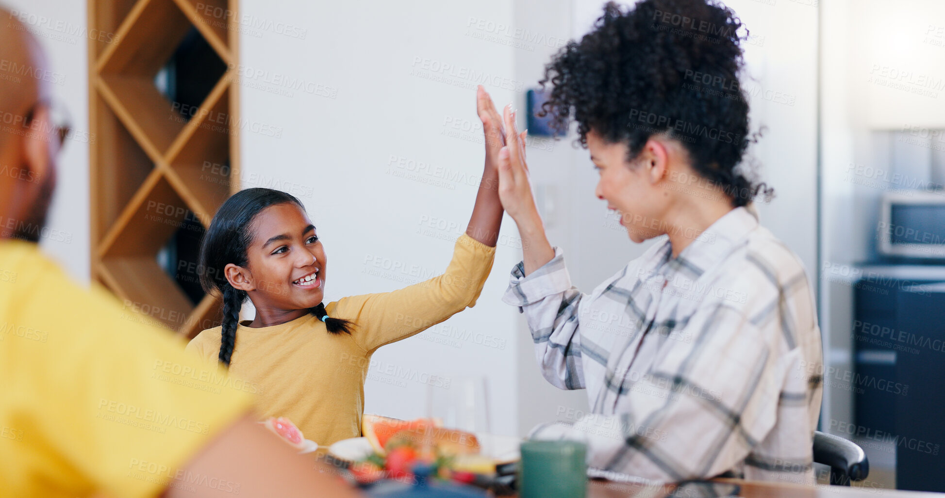 Buy stock photo Smile, high five and a family eating breakfast in the kitchen of home together in the morning for health. Food, love or support with a mother and daughter bonding or enjoying a meal for nutrition