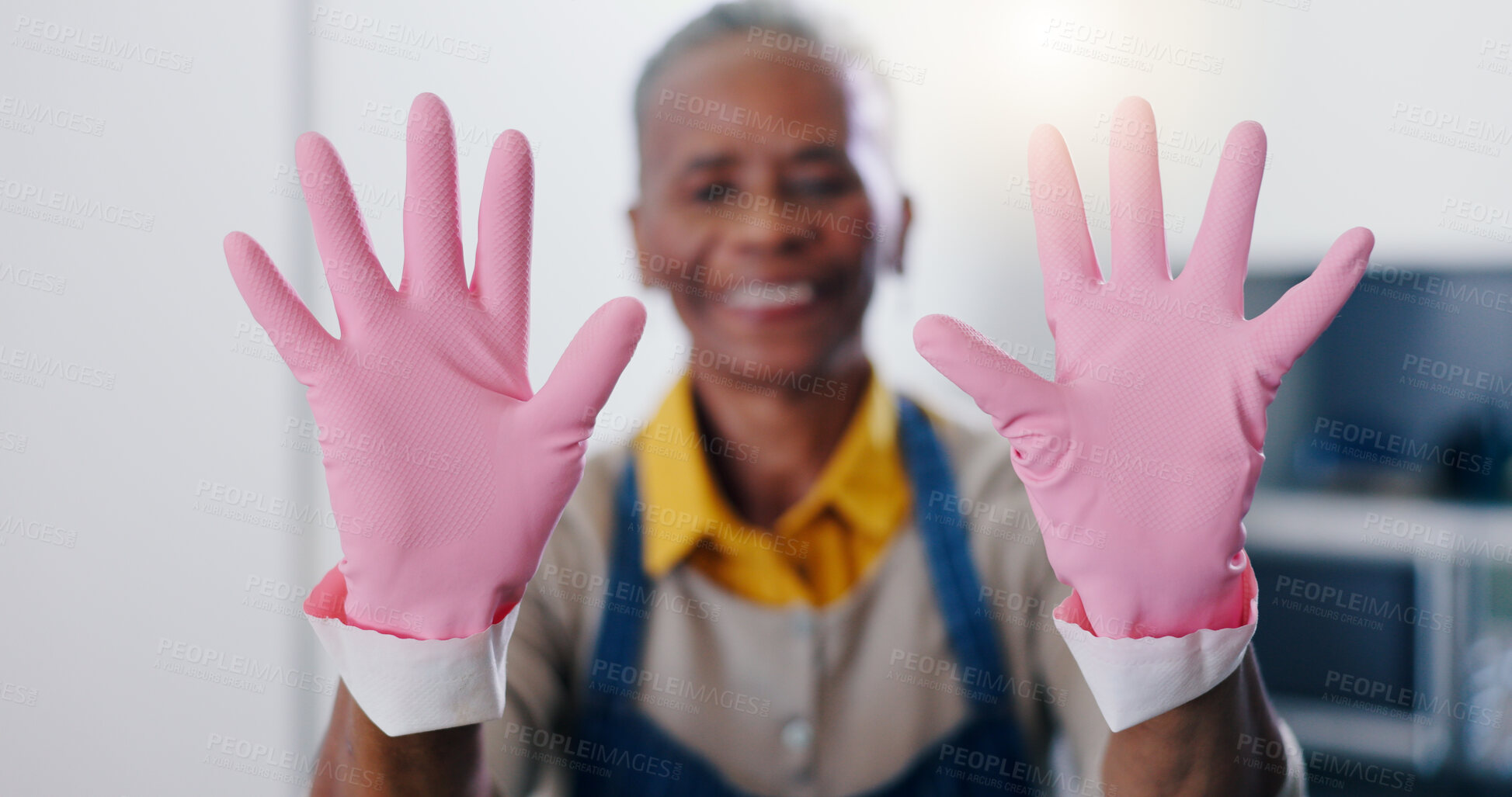 Buy stock photo Hands, hygiene and gloves for cleaning with person housekeeper in home kitchen at hospitality guest house. Safety, service and pink rubber or latex with cleaner in apartment for housekeeping chores