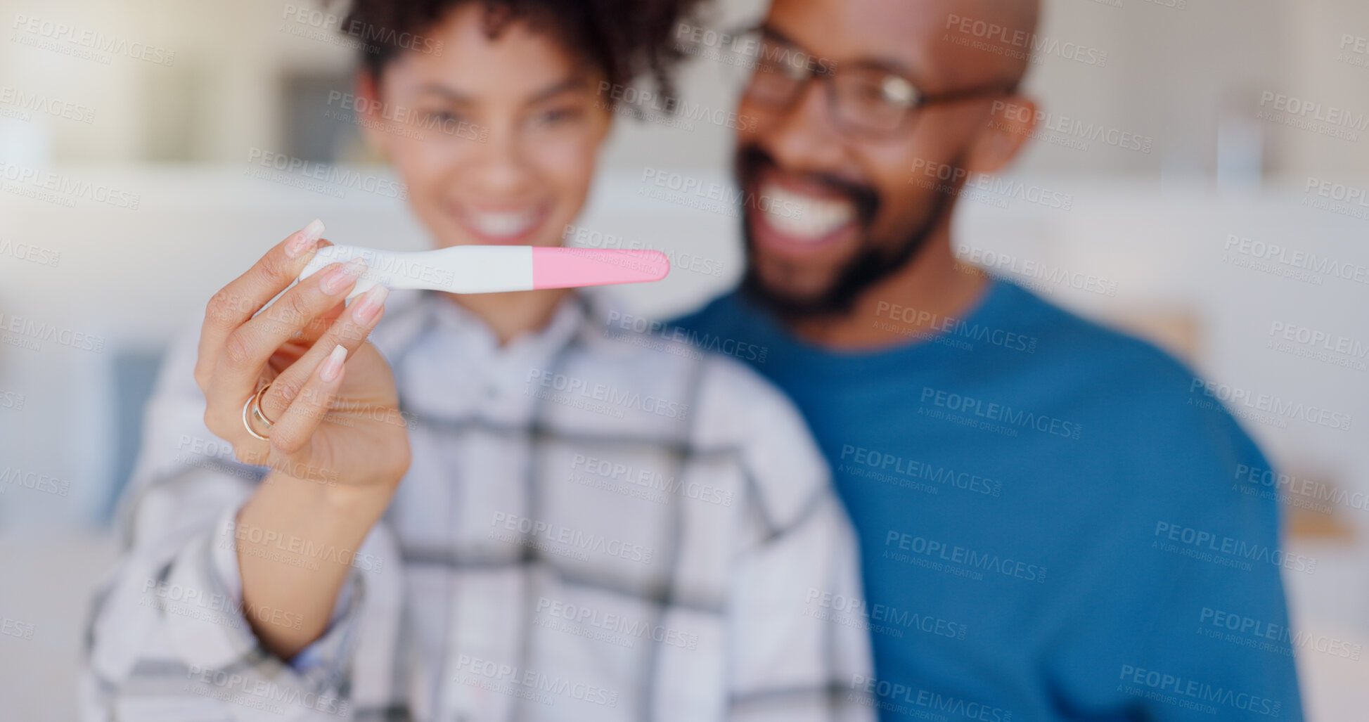 Buy stock photo Happy couple, hands and positive pregnancy test for family, start or maternity at home. Closeup of excited man and pregnant woman smile for parenthood, morning or good results in bedroom together