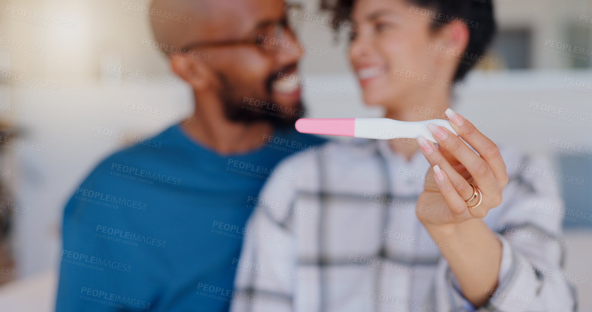 Buy stock photo Excited couple, hands and positive pregnancy test for family, start or maternity at home. Closeup of happy man and pregnant woman smile for parenthood, morning or good results in bedroom together