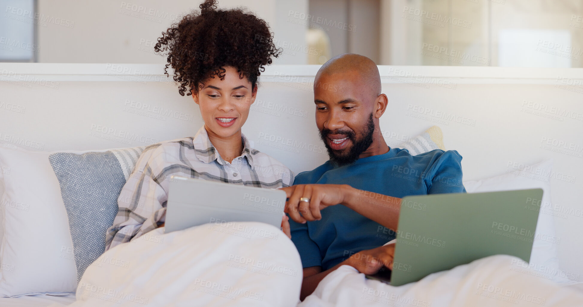 Buy stock photo Home, bed and black couple with a laptop, typing and smile with love, bonding and streaming a movie. Bedroom, apartment and man with woman, connection and film with internet, happiness and relaxing