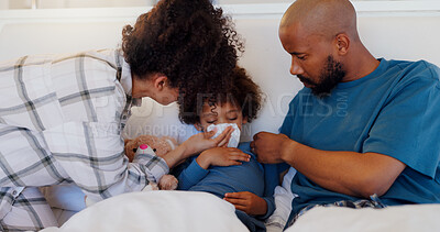 Buy stock photo Mother, father and sick child in bed blowing nose for virus, infection or disease in care or support at home. Mom, dad and kid with flu, cold or symptoms for allergies, sinus or morning in bedroom