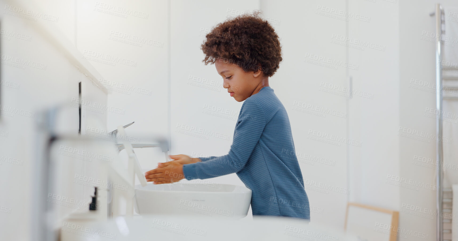 Buy stock photo Child, tap and washing or cleaning hands for hygiene, bacteria or germ removal in sink at home. Little boy or kid rinsing soap in bathroom, water or basin for disinfection or cleanliness at house