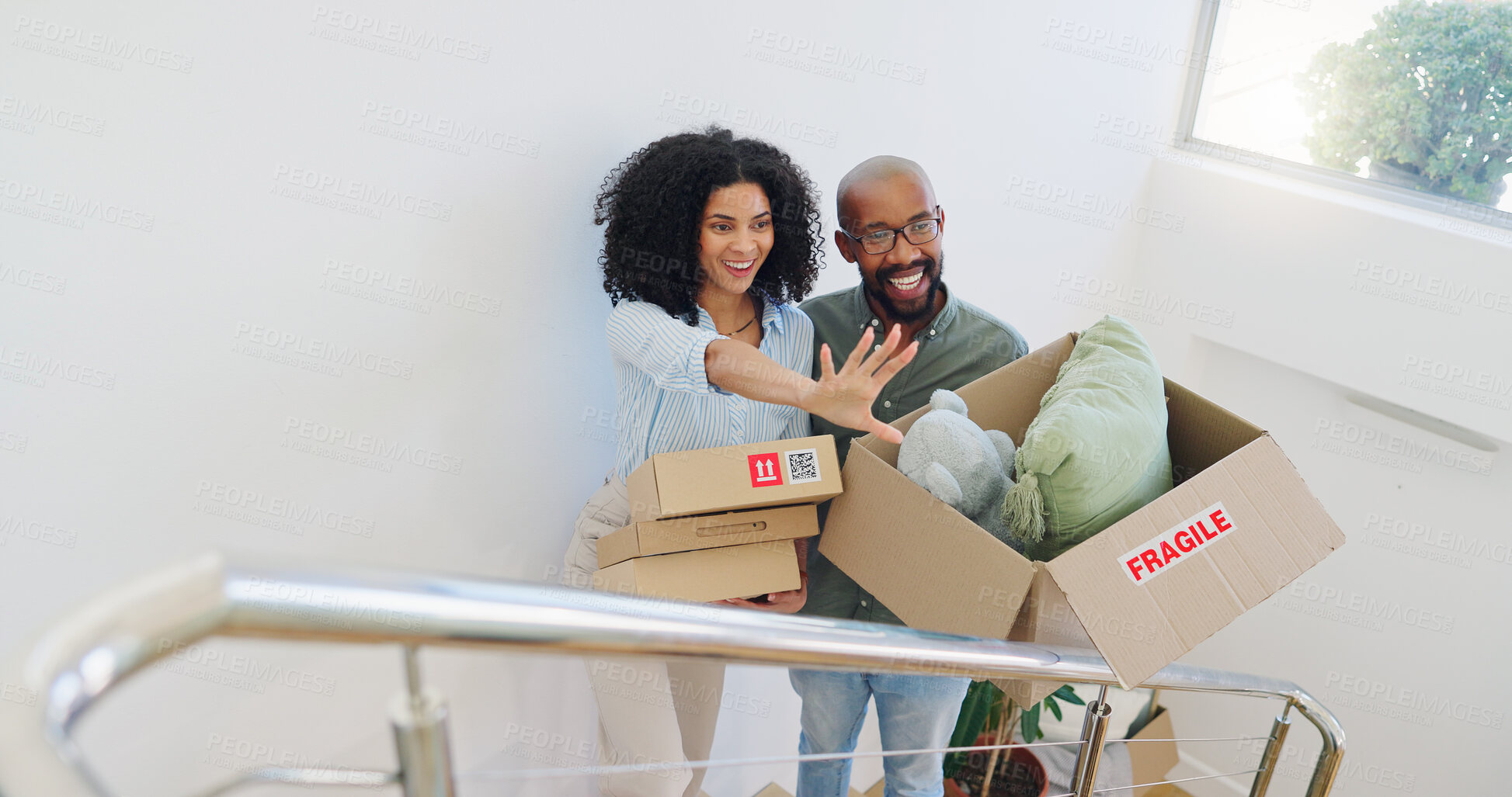 Buy stock photo Real estate, box and vision with a black couple moving house for growth, investment or mortgage. Property, smile or happy with a man and woman on stairs in their new home together for future planning