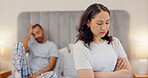 Frustrated couple, bed and fight in conflict, disagreement or argument for divorce or breakup at home. Man and woman ignore in cheating affair, toxic relationship or mistake for drama in bedroom