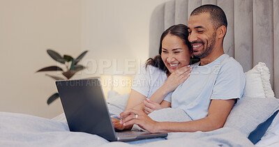 Buy stock photo Laptop, happy and young couple in bed watching movie, film or show together at home. Smile, technology and man and woman relaxing in bedroom streaming a video on computer for bonding at modern house.