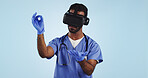 Nurse, man and virtual reality glasses for surgery, healthcare innovation and surgeon on a blue studio background. Doctor, medical and professional with VR eyewear, future and tech with digital app