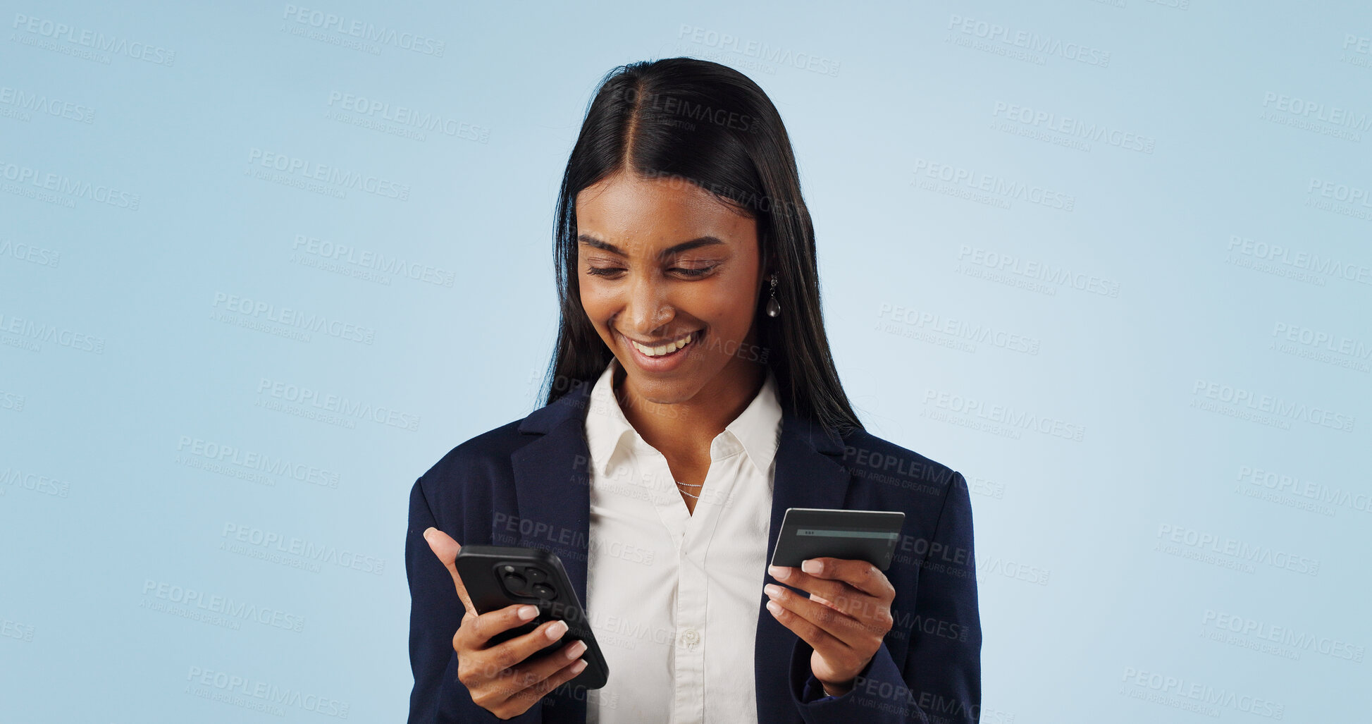 Buy stock photo Happy business woman, phone and credit card for payment or online shopping against a blue studio background. Female person or employee smile with mobile smartphone in banking or transaction on mockup