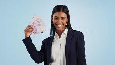 Happy business woman, portrait and money fan in financial freedom against a blue studio background. Excited female person or employee with cash, savings or investment for bonus salary on mockup space