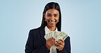 Business woman, portrait and money in financial freedom against a blue studio background. Happy female person or employee with cash, savings or dollar bills for bonus salary or investment on mockup